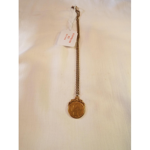 228 - A Victorian 1884 gold sovereign with 9ct gold mount and chain total weight 14.53 gms