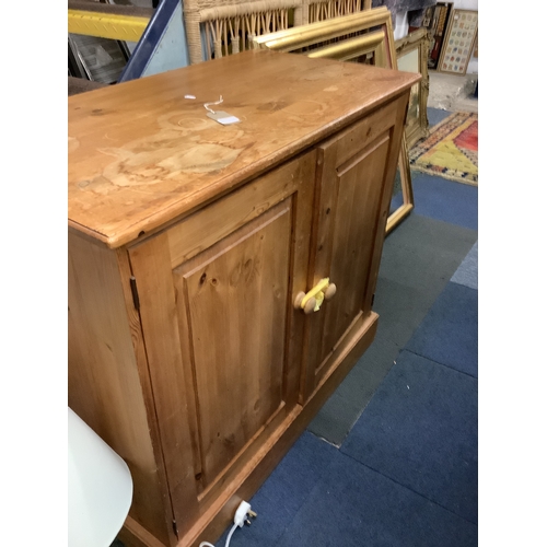 505 - A pine double cupboard