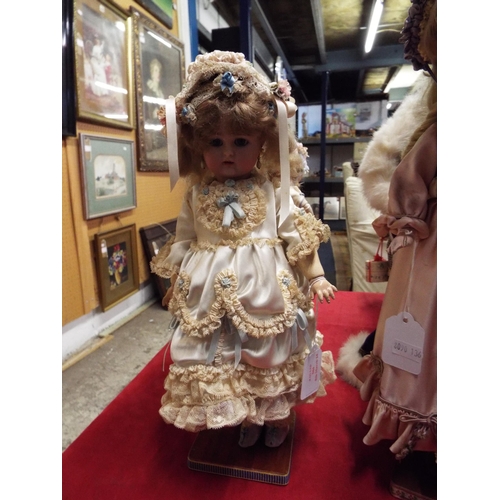 504 - A vintage 13” Kämmer & Reinhardt Simon Halbig 34 bisque head doll in period outfit (not original cos... 