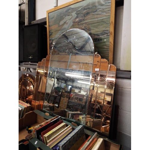 515 - An Art Deco style arch top mirror with two-tone copper effect