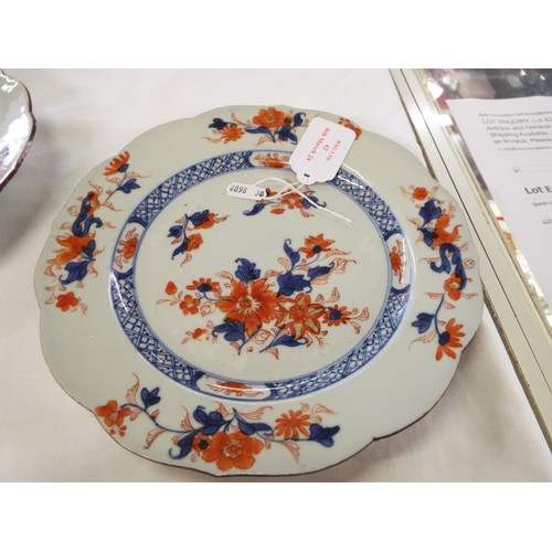 42 - A pair of early Chinese plates with blue and red floral decoration