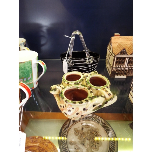 101 - A Torquay pottery entwined three pots and a Murano glass handbag