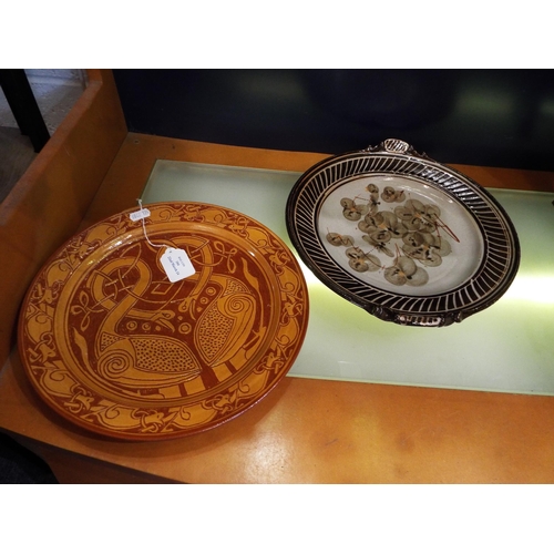 104 - An Anvil Pottery charger together with another