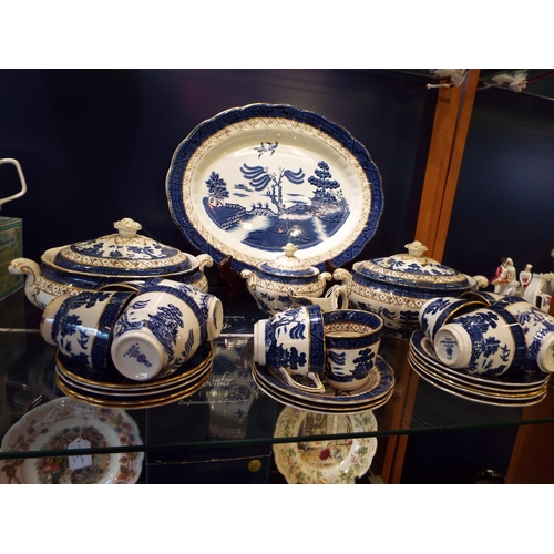60 - A mixed selection of Booths and Royal Doulton 'Real Old Willow' pattern china to include coffee cans... 