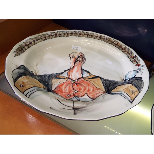 67 - An Iden Pottery meat platter with hand-painted Beatrix Potter turkey decoration signed Mick Avery 19... 