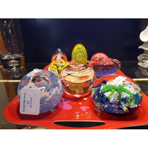 75 - A Caithness glass paperweight, following 'Surf Yacht' together with a lizard paperweight and six oth... 