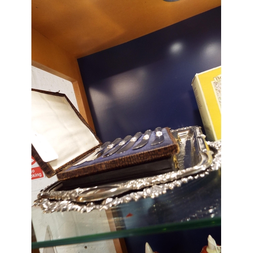 94 - A boxed set of six silver-plated butter knives together with two trays and a vintage drawing set