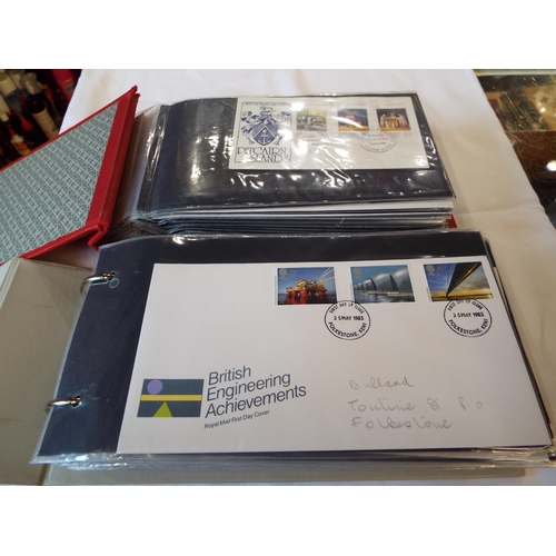 107 - Two albums housing a quantity of First Day Covers to include 'RX 102 Fishing', 'The National Trust',... 