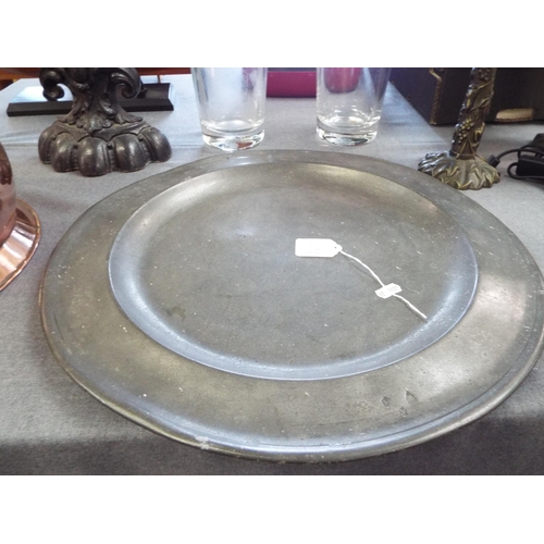 334 - A large early pewter charger with makers marks