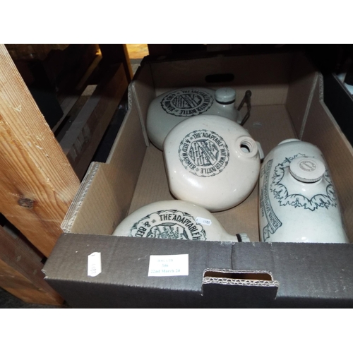 346 - Four assorted water bottles to include 'The Adaptable Hot Water Bottle' and 'Doulton Improved Foot W... 
