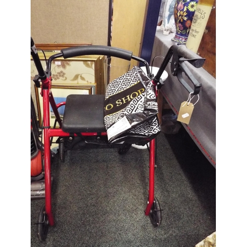 416 - A Drive rollator walking aid having under seat bag, backrest, rear wheel brake tightening handle, an... 