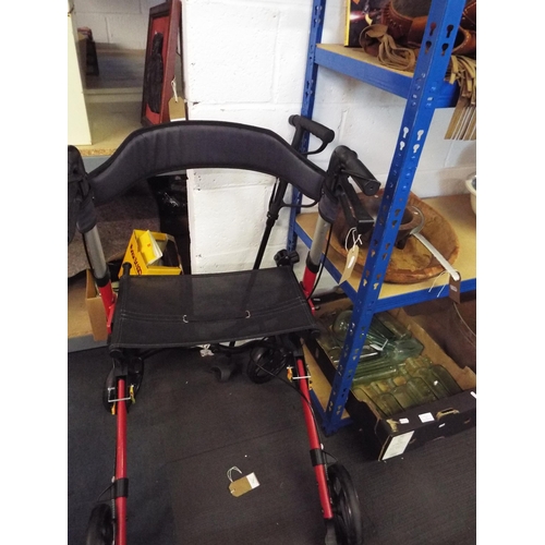 418 - A Go plus Lightweight Foldable Rollator Walker with walking aid brakes seat and adjustable arms and ... 