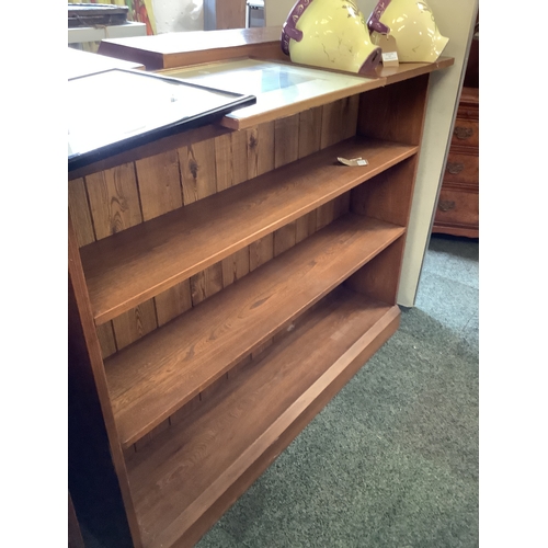 620 - A stained oak two tier bookcase