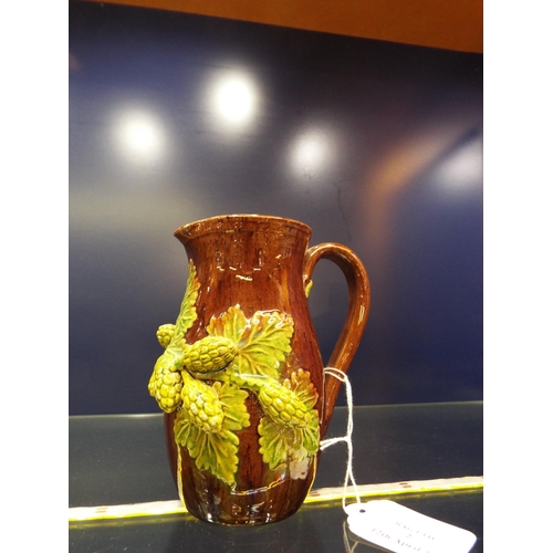 2 - A Rye Pottery brown glazed milk jug with applied hops and vine marks to base 5