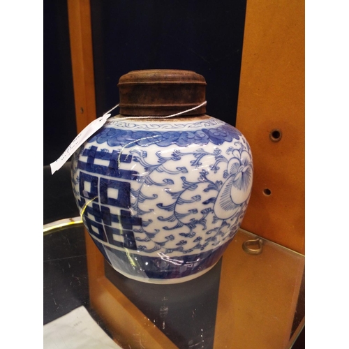 10 - A Chinese blue and white ginger jar with wooden lid