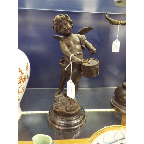 26 - A bronze art nouveau statue of a angel cherub playing the drums