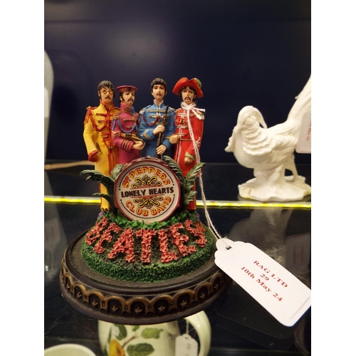 29 - A Franklin Mint The Beatles Sergeant Peppers Lonely Hearts limited edition figural group 10 cm high