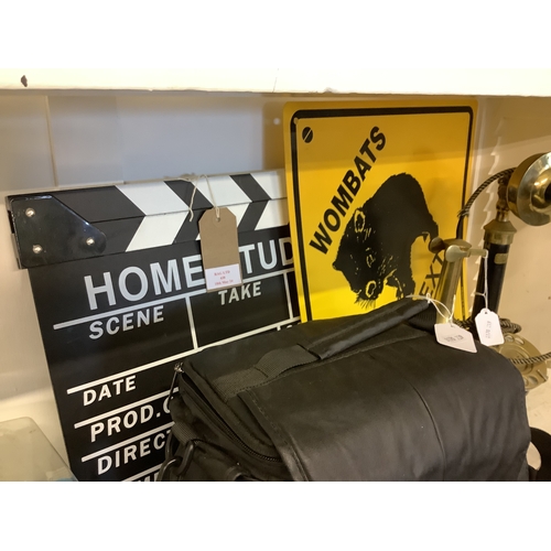 438 - A Director's Clapper Board wall art together with a Wombats sign