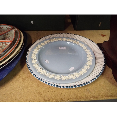 503 - A Wedgwood charger together with another