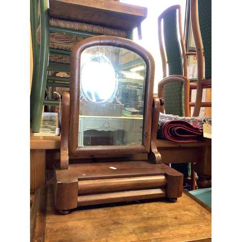 556 - A mahogany swing dressing mirror with short drawer