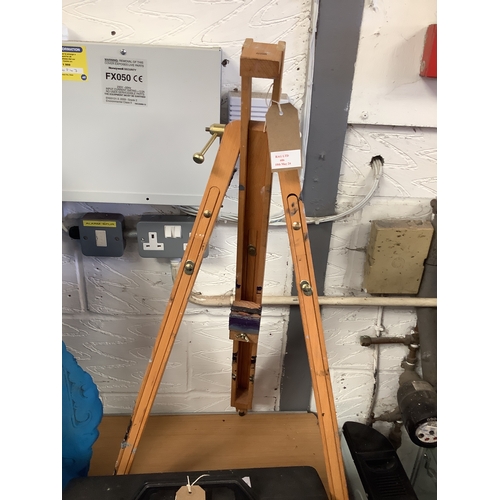 606 - A wooden folding easel