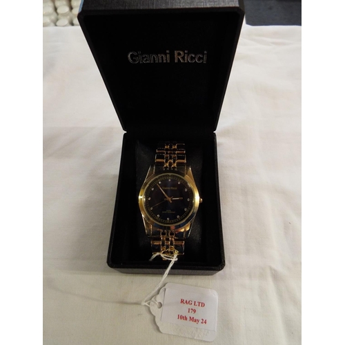 179 - A boxed as new Gianno Ricci gold tone wristwatch