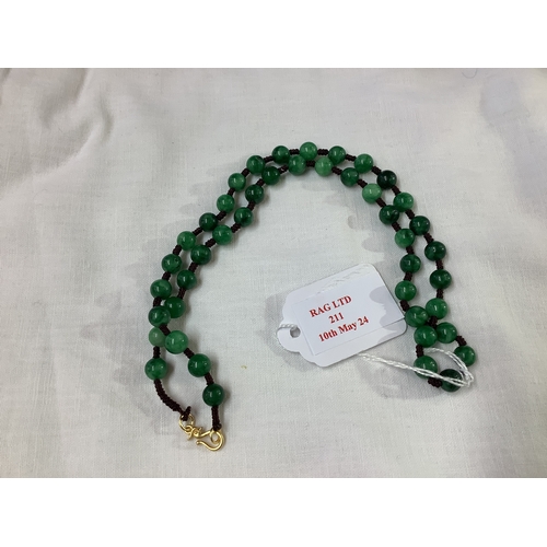 211 - A natural jade beaded necklace