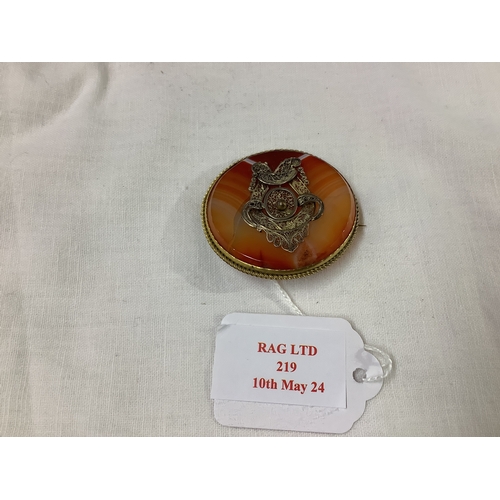 219 - A vintage carnelian agate brooch inset with silver filigree