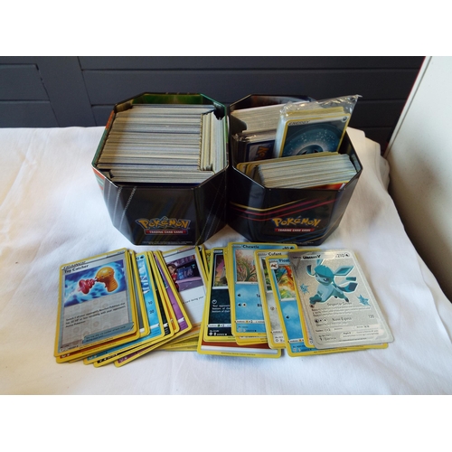 106 - A mixed selection of assorted Pokemon trading cards to include 'Evolving Skies Glaceon V', 'Thievul'... 