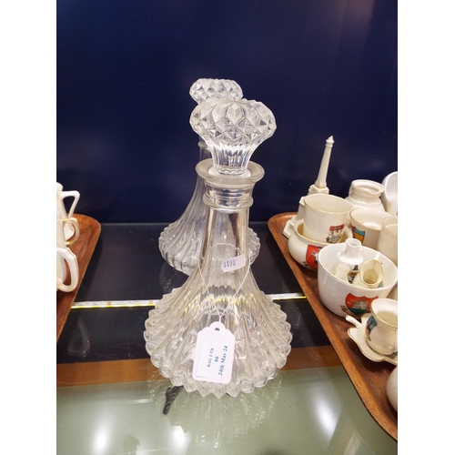 66 - A pair of cut glass decanters