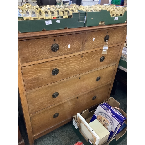 621 - An oak chest of four long drawers