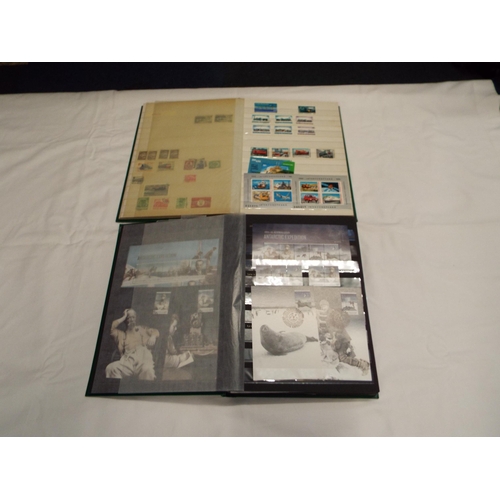 68 - Two albums housing a large quantity of stamps of the World to include 'St Vincent', 'Sierra Leone', ... 