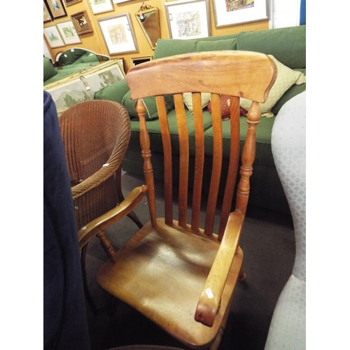 509 - A vintage beech carver chair