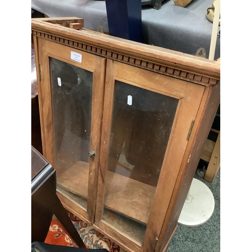 541 - An antique satinwood and glass hanging cabinet