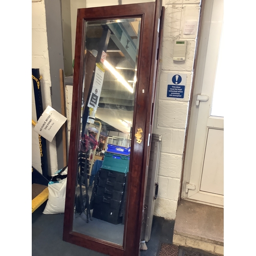 607 - A Victorian mahogany framed mirrored door made into horizontal wall mirror and a mahogany panel