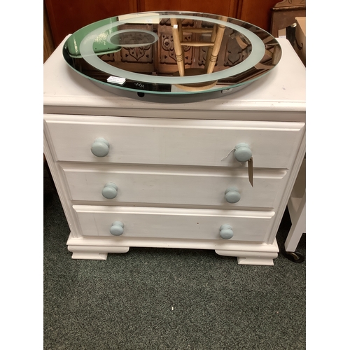 626 - A white painted chest of three long drawers