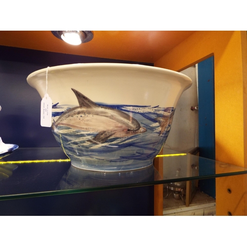 25 - A large Steve Duffy of Rye Pottery bowl having external dolphin scene and internal butterflies, init... 