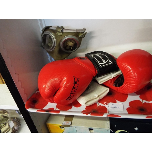 450 - A pair of Bytomic Performer V4 boxing gloves, a pair of First Protector inner pads and a gas mask