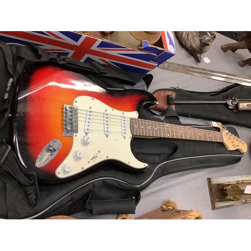 301 - A Rockburn electric guitar and soft carry case