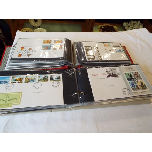 66 - Two albums housing a quantity of First Day Covers to include 'RX 102 Fishing', 'The National Trust',... 