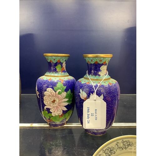 22 - A pair of cloisonné blue ground enamelled vases having floral decoration