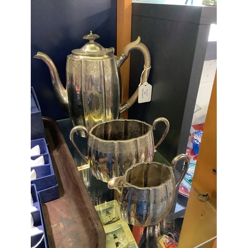 105 - A silver-plated coffee pot milk jug and sugar bowl