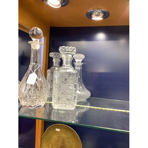 39 - Four cut glass decanters