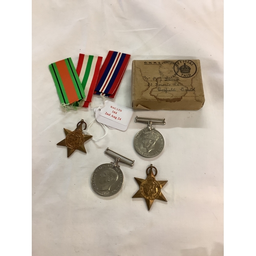 164 - Four WWII medals to include Defence medal, Italy Star, 1939-1945 Star and 1939-1945 medal and three ... 