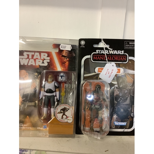 427 - Two boxed Star Wars figurines 'The Mandalorian' and 'Captain Rex'