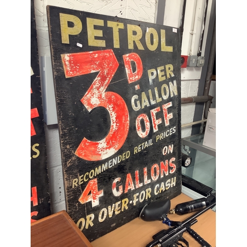 462 - A vintage 1970's hand-painted garage sign 'Petrol 3D off Per Gallon Recommended Retail Price on 4 Ga... 