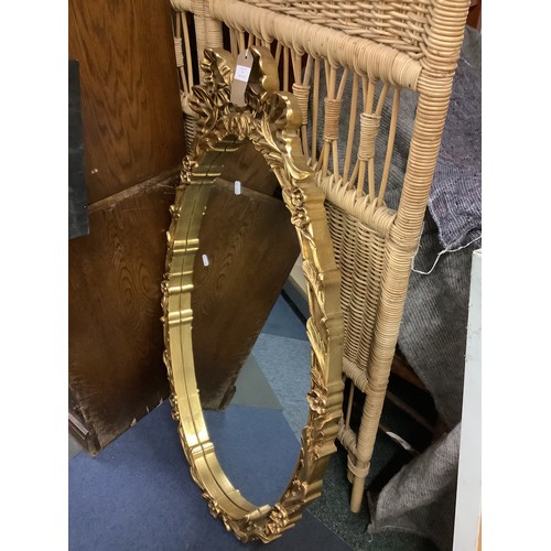 497 - A gilt framed oval mirror