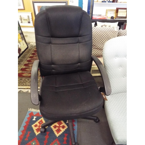 504 - A black upholstered office swivel chair