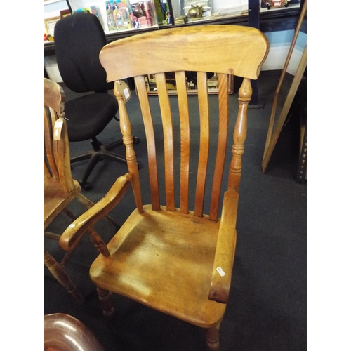 507 - A vintage beech carver chair