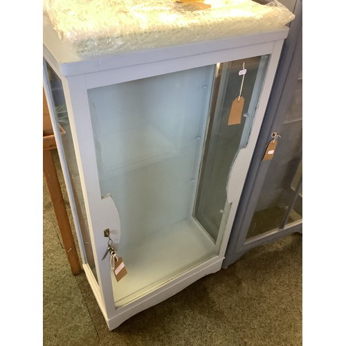 554 - A blue painted glass display cabinet with glass shelves